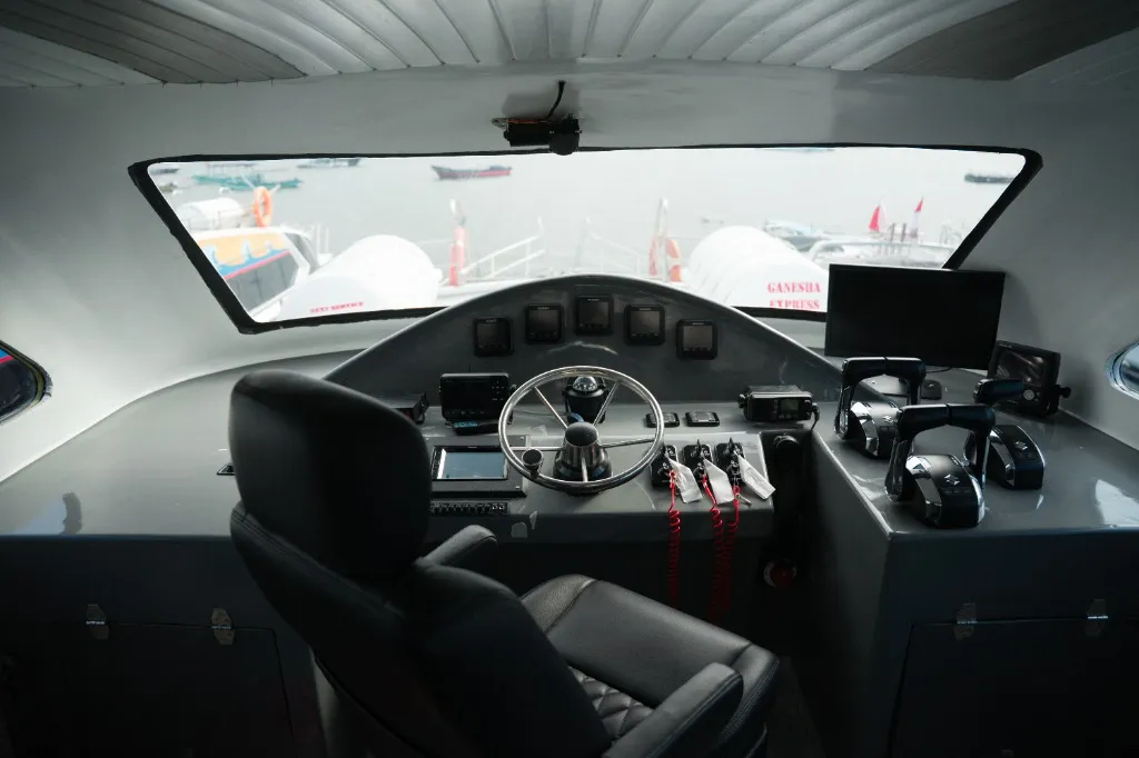 Modern cockpit and advanced navigation system of Speedboat C for Komodo tour