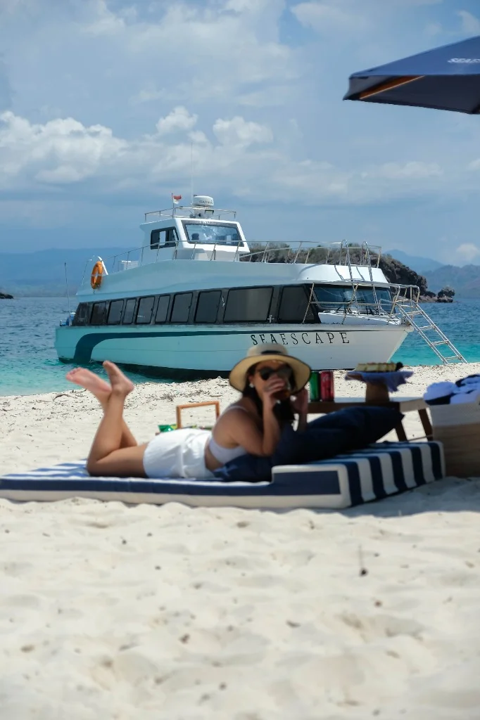Speedboat D anchored at a beautiful beach for Speedboat charter labuan bajo